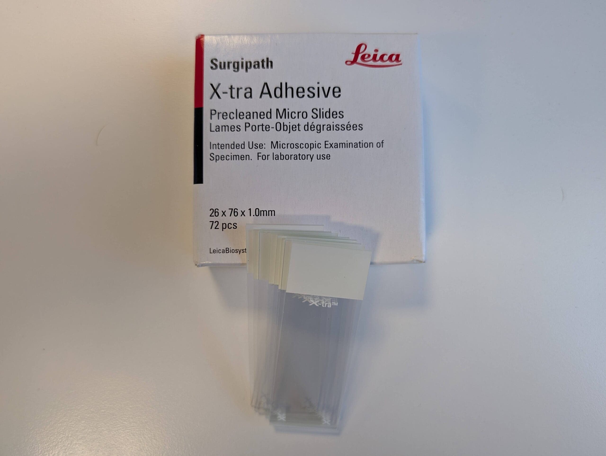 Produktbild - VF000193293 - Objektglas tomo elektrostatiska med hög adhesivitet med vit skrivyta för immunohistokemi 75x25x1mm 72-pack