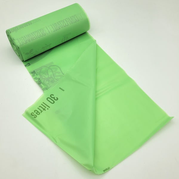 Produktbild - 62299 - Plastpåse för källsorteringskärl förnybar grön 30L 590mmx60cm 100st/rulle
