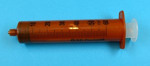 Produktbild - 82966 - Infusionsspruta luer-lock bärnstensfärgad med 1,0ml gradering 50/60ml